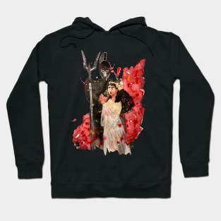 Persephone bites into the Pomegranate Hoodie